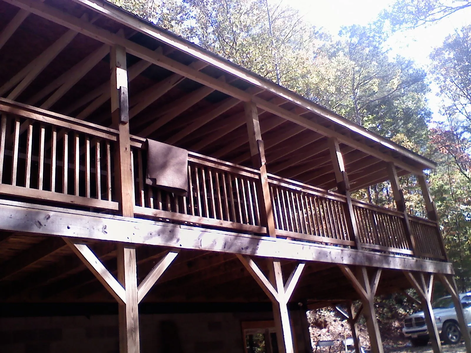 Timber framing under a new elevated porch and deck — Roof Leak Repair in High Bridge by Roofing Brothers